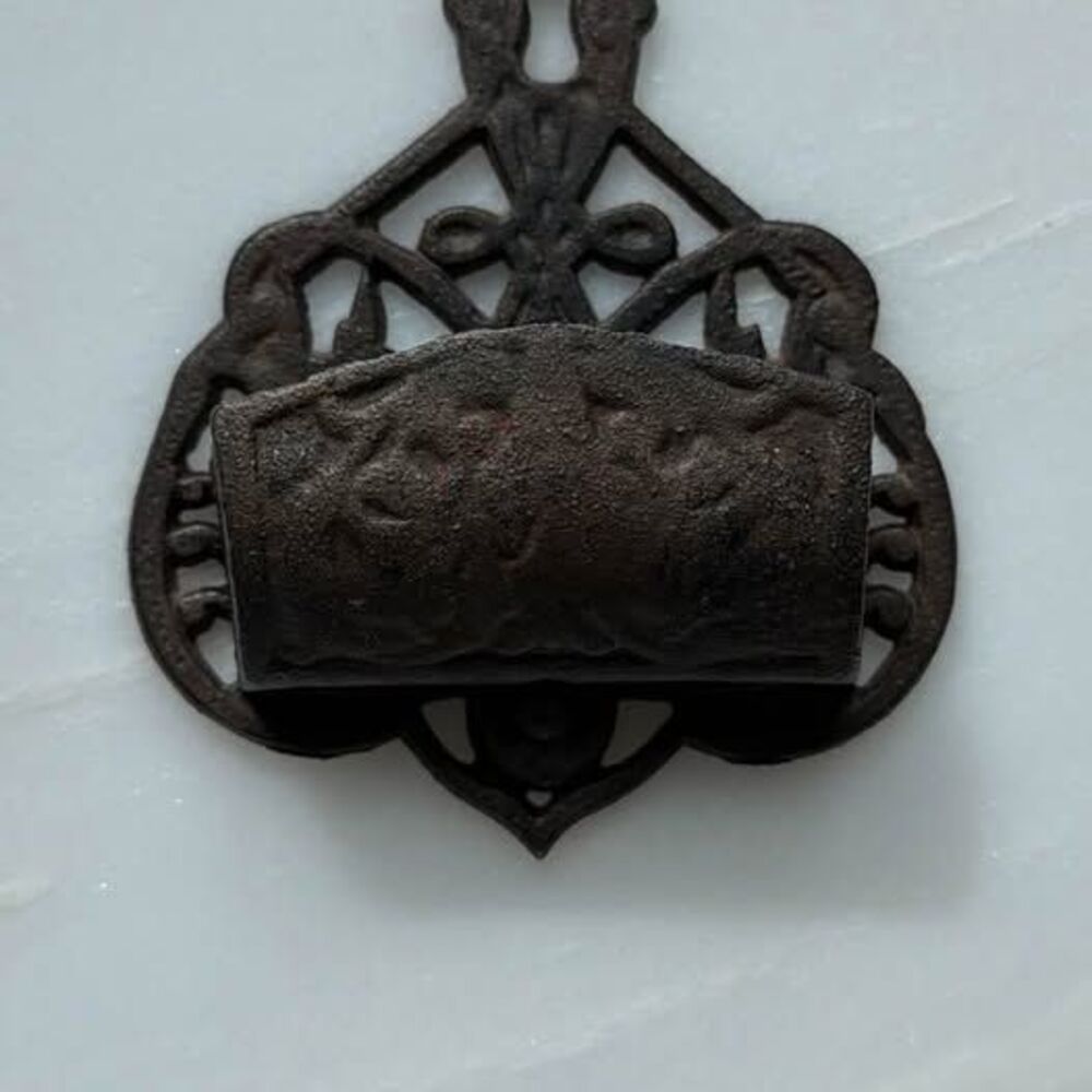 Antique cast iron wall mount match holder